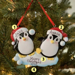 Penguin Couple Throwing Snowballs Personalized Christmas Ornament OR1318